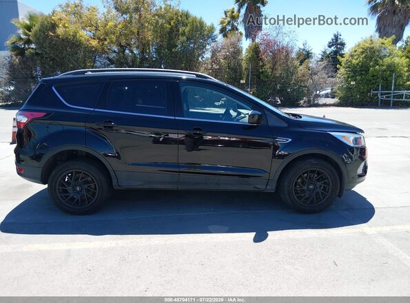 1FMCU0GD4JUD21829 2018 FORD ESCAPE Black Rear interior view