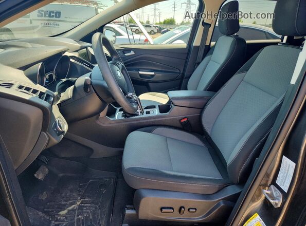 1FMCU0GD4KUB75949 2019 FORD ESCAPE Gray Widok wnętrza z przodu