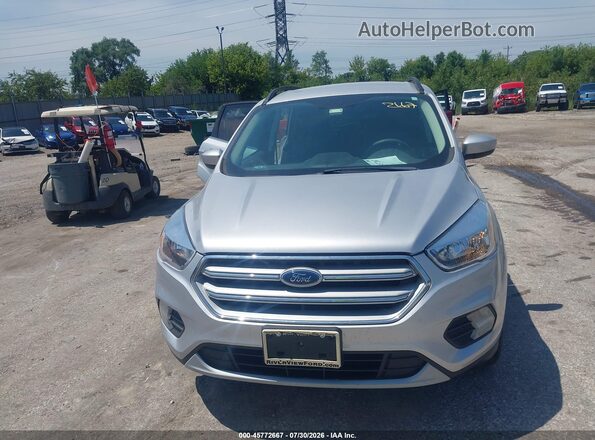 1FMCU0GD5JUD00343 2018 FORD ESCAPE Silver Սարքավորումների վահանակի տեսք