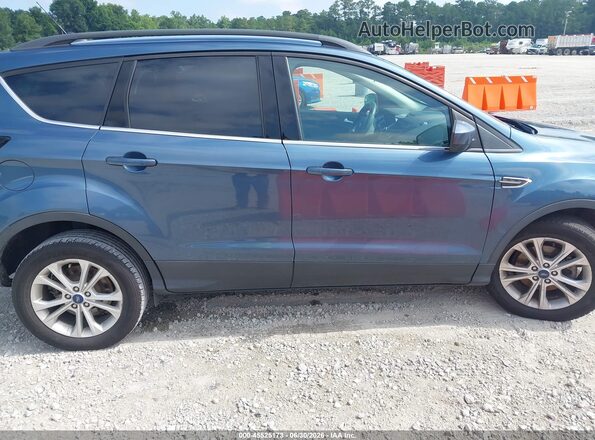 1FMCU0GD6JUC68261 2018 FORD ESCAPE Blue Rear interior view