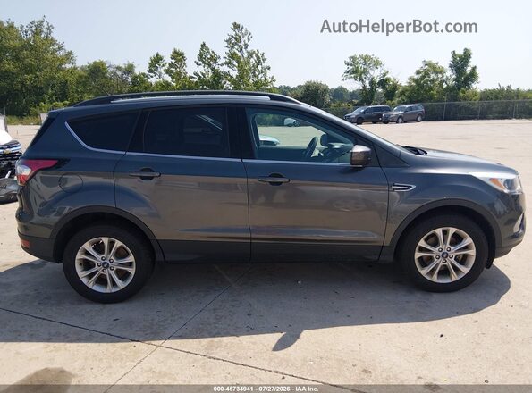 1FMCU0GD7JUC48228 2018 FORD ESCAPE Beige Widok wnętrza z tyłu