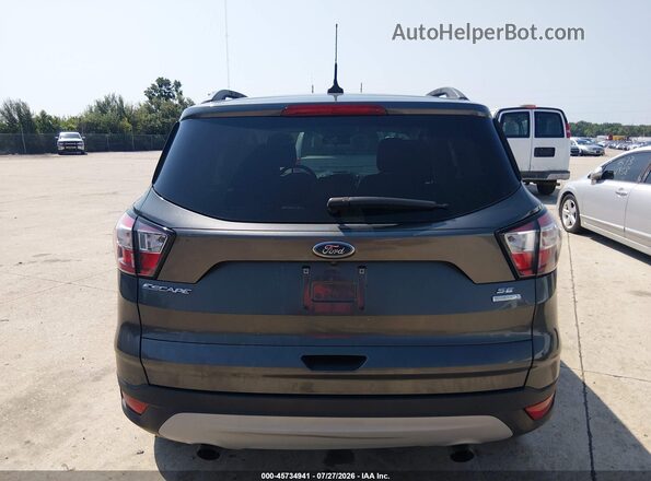 1FMCU0GD7JUC48228 2018 FORD ESCAPE Beige 