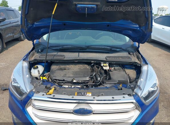 1FMCU0GD8HUA02606 2017 FORD ESCAPE Blue Vista trasera