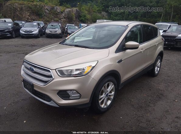 1FMCU0GD8HUA40255 2017 FORD ESCAPE Gold Առջևի ձախ երեք քառորդ տեսարան