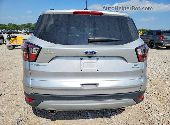 1FMCU0GD8HUB99616 2017 FORD ESCAPE Silver Widok z tyłu