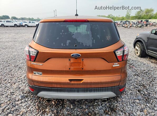 1FMCU0GD8HUC37975 2017 FORD ESCAPE Brown Rear view