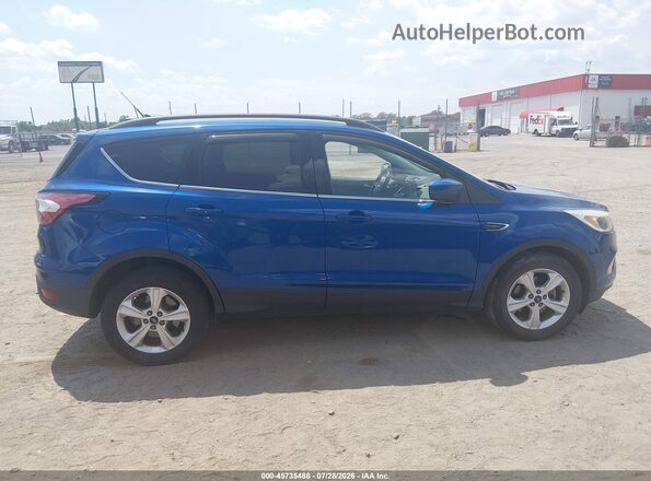 1FMCU0GD8JUB79548 2018 FORD ESCAPE Blue Սալոնի հետևի տեսք