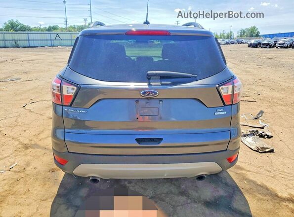 1FMCU0GD8JUC28585 2018 FORD ESCAPE Gray Vista trasera