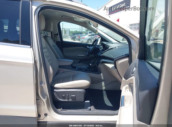 1FMCU0GD9HUA57758 2017 FORD ESCAPE Champagne Front interior view