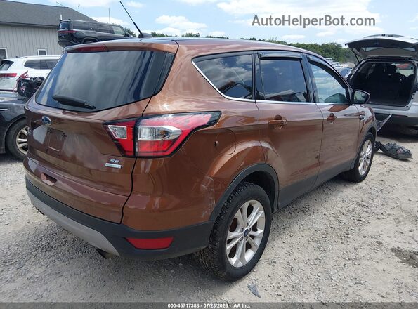 1FMCU0GD9HUB06425 2017 FORD ESCAPE Orange Tył prawy