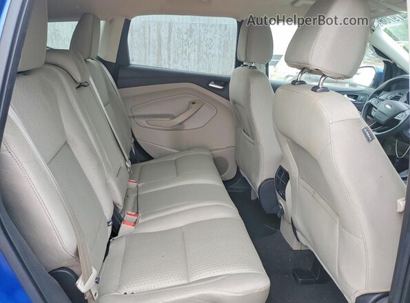 1FMCU0GD9HUF06338 2017 FORD ESCAPE Blue Vista interior trasera