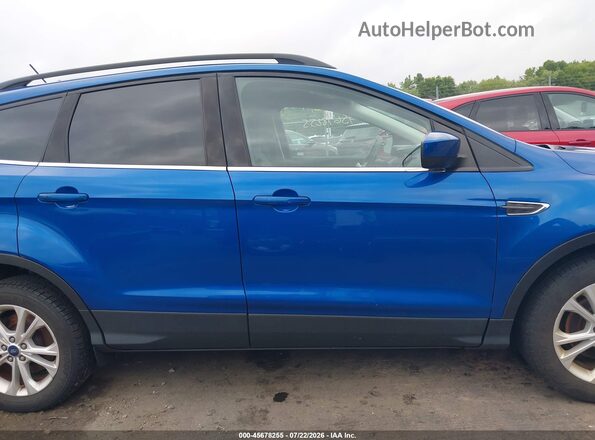 1FMCU0GD9JUA08937 2018 FORD ESCAPE Blue Widok wnętrza z tyłu