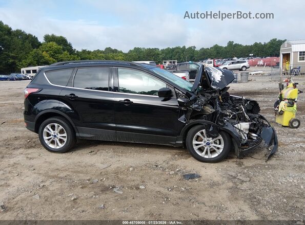 1FMCU0GD9JUA78423 2018 FORD ESCAPE Black Rear interior view