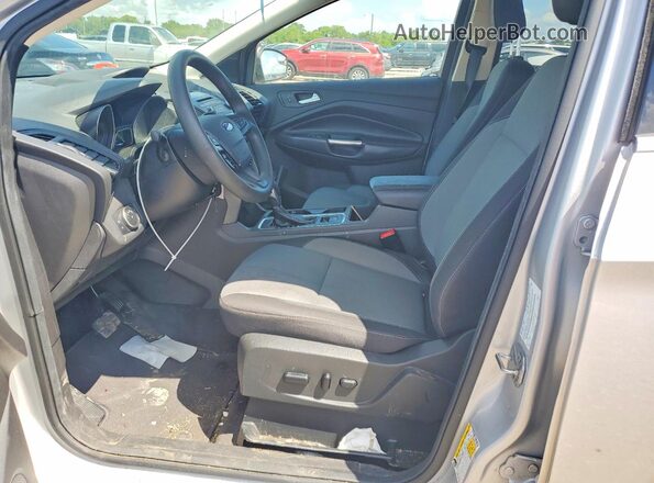 1FMCU0GD9JUD54938 2018 FORD ESCAPE Silver Front interior view