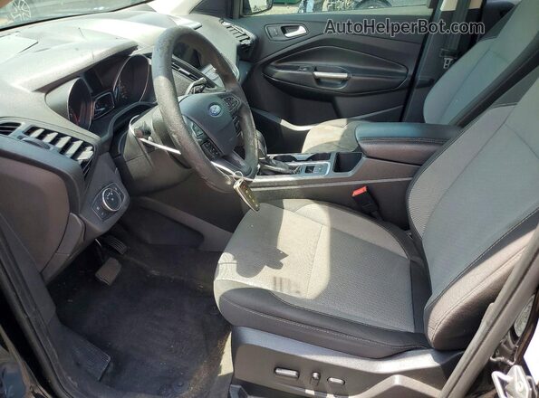 1FMCU0GD9KUB47581 2019 FORD ESCAPE Black Front interior view