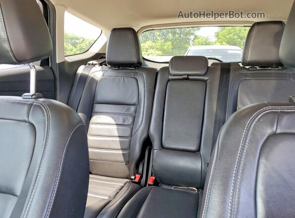 1FMCU0GDXHUD30772 2017 FORD ESCAPE White Vista de los asientos traseros