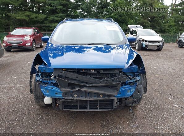 1FMCU0GDXJUA82108 2018 FORD ESCAPE Blue Vista interior trasera