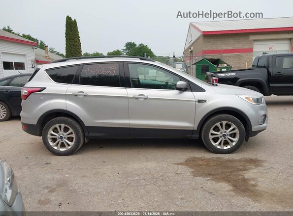 1FMCU0GDXJUB59530 2018 FORD ESCAPE Silver უკანა სალონის ხედი