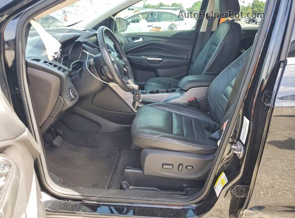1FMCU0GX5GUC20236 2016 FORD ESCAPE Black Вид салону спереду