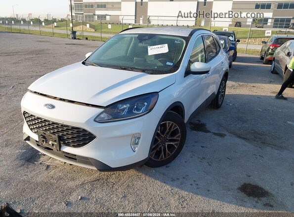 1FMCU0H60MUB34835 2021 FORD ESCAPE White Vista tres cuartos delantera izquierda
