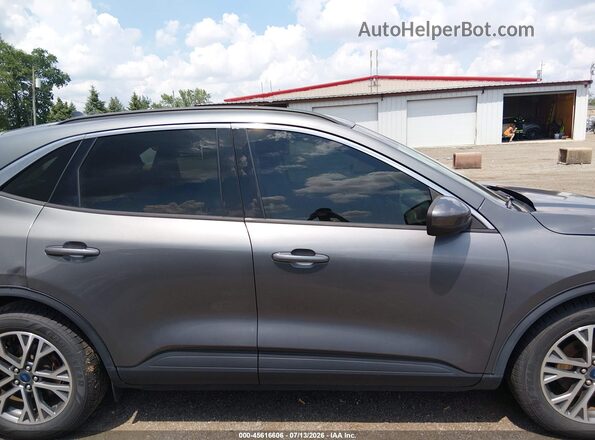 1FMCU0H61MUB35461 2021 FORD ESCAPE Серый Вид задней части салона