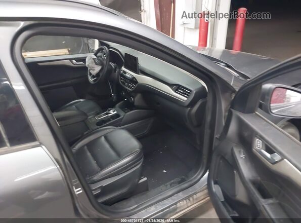 1FMCU0H65MUB06030 2021 FORD ESCAPE Серый Вид салона спереди