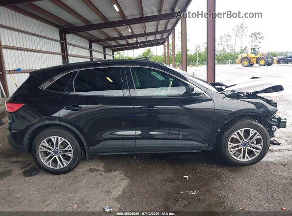 1FMCU0H69NUB94646 2022 FORD ESCAPE Black Rear interior view