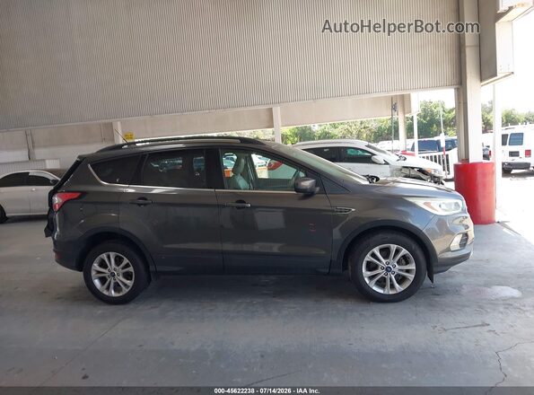 1FMCU0HD0JUB66971 2018 FORD ESCAPE Gray Rear interior view