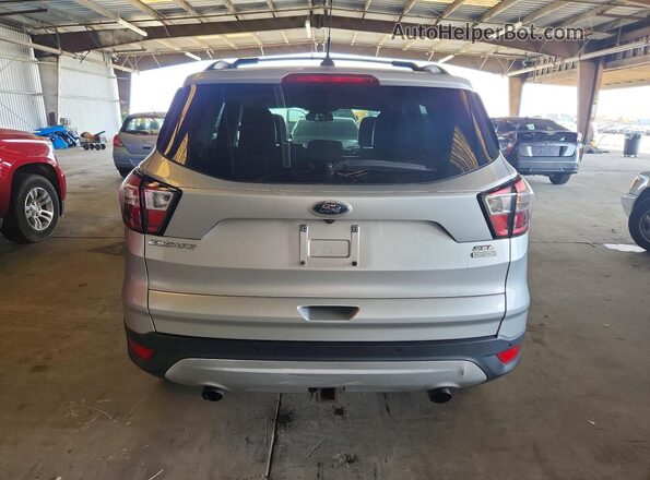 1FMCU0HD0JUC86754 2018 FORD ESCAPE Silver Rear view
