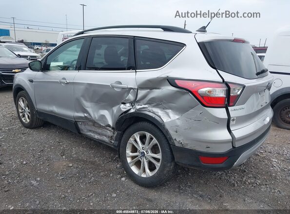 1FMCU0HD5JUC56486 2018 FORD ESCAPE Silver Trasero izquierdo
