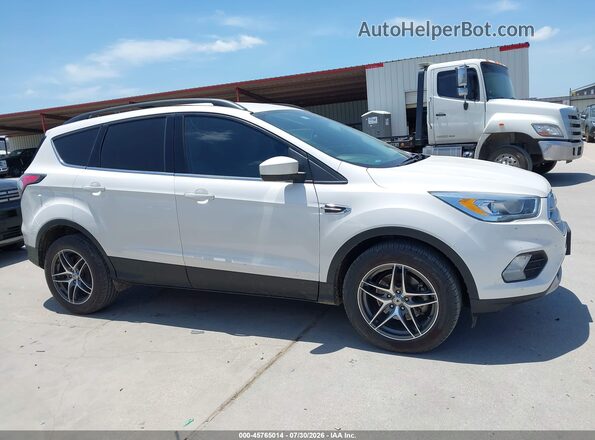 1FMCU0HD6JUB72645 2018 FORD ESCAPE White Widok wnętrza z tyłu