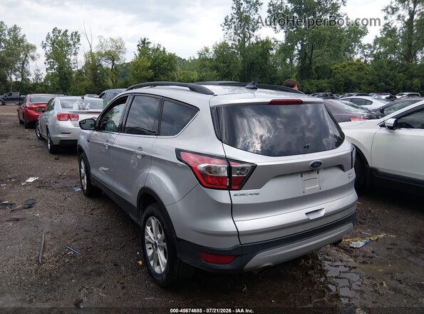 1FMCU0HD6JUD01855 2018 FORD ESCAPE Silver Trasero izquierdo