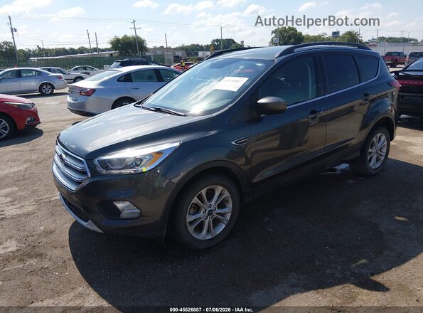1FMCU0HD7KUB58092 2019 FORD ESCAPE Gray Vista tres cuartos delantera izquierda