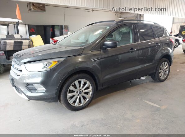 1FMCU0HD8KUC47637 2019 FORD ESCAPE Gray Vista tres cuartos delantera izquierda