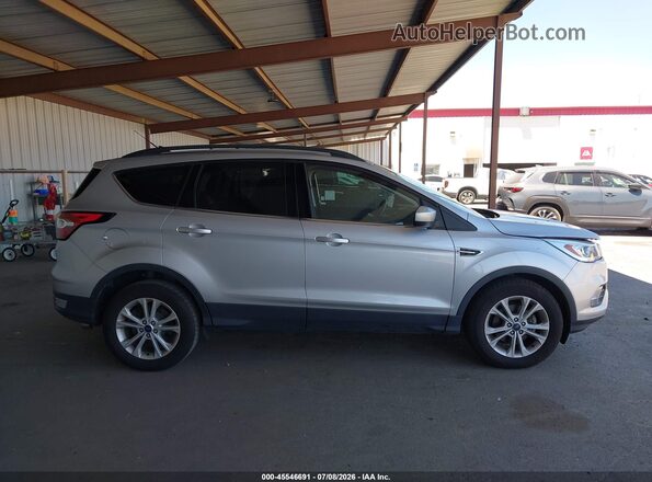 1FMCU0HD9JUC36161 2018 FORD ESCAPE Silver უკანა სალონის ხედი
