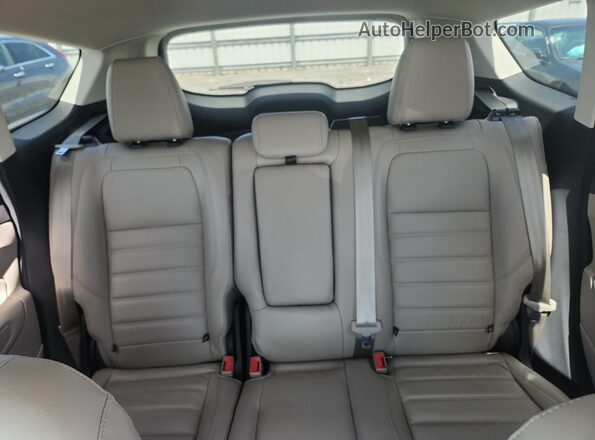 1FMCU0HD9JUD34381 2018 FORD ESCAPE White Rear seats view