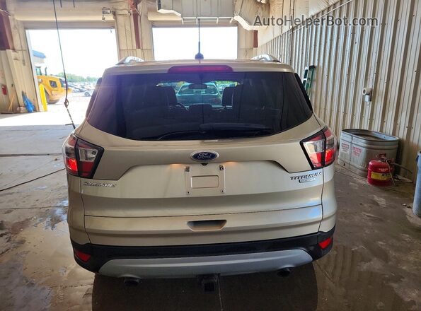 1FMCU0J90HUB01571 2017 FORD ESCAPE Tan უკანა ხედი