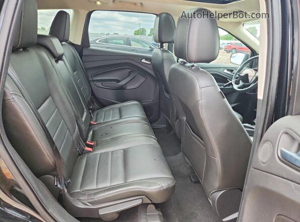 1FMCU0J91GUA38995 2016 FORD ESCAPE Black Rear seats view