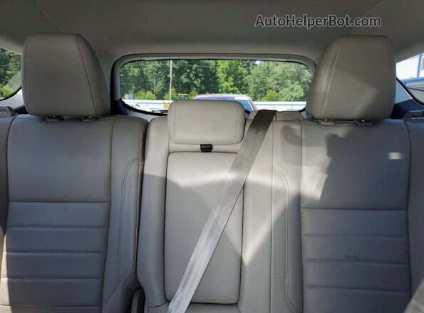1FMCU0J91GUB19396 2016 FORD ESCAPE Silver Rear seats view