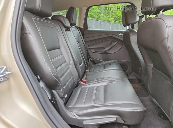 1FMCU0J91HUB07976 2017 FORD ESCAPE Beige Rear interior view