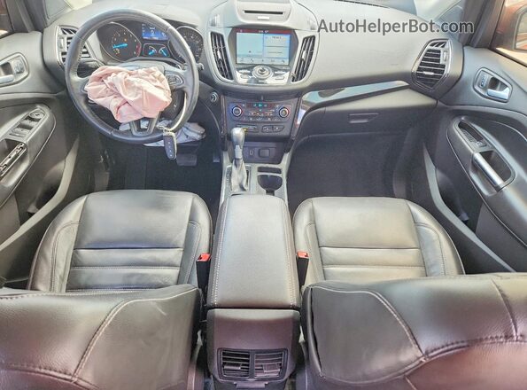 1FMCU0J91HUB74383 2017 FORD ESCAPE Оранжевый Вид панели приборов