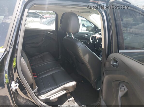 1FMCU0J94GUB70830 2016 FORD ESCAPE Black VIN sticker view