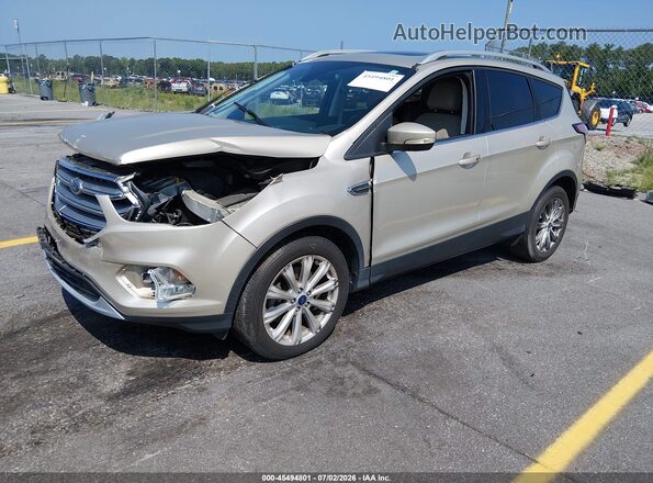 1FMCU0J94HUD81477 2017 FORD ESCAPE Gold Vista tres cuartos delantera izquierda