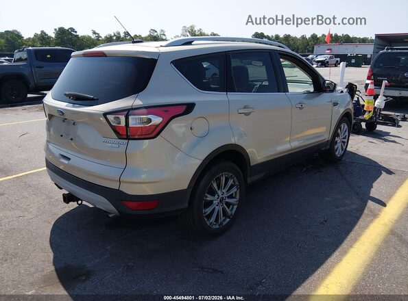 1FMCU0J94HUD81477 2017 FORD ESCAPE Gold Trasero derecho