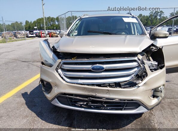1FMCU0J94HUD81477 2017 FORD ESCAPE Gold Vista frontal