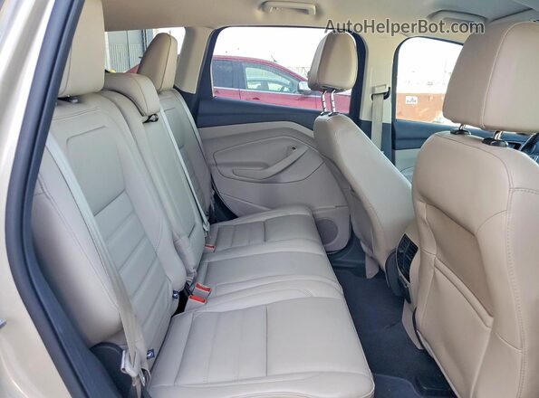 1FMCU0J95HUE72242 2017 FORD ESCAPE Beige Вид задньої частини салону