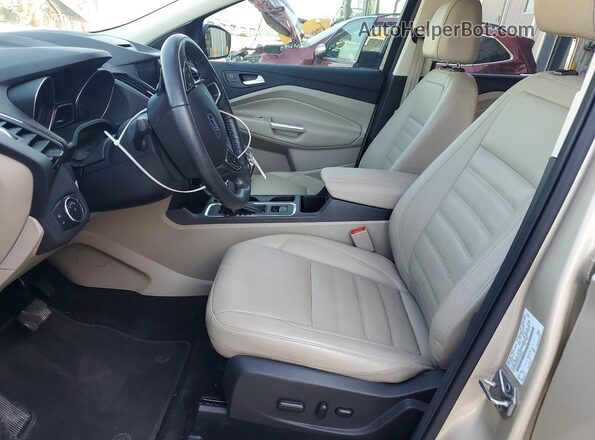 1FMCU0J95HUE72242 2017 FORD ESCAPE Beige Вид салону спереду