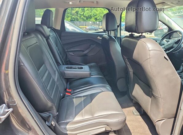 1FMCU0J97HUD90643 2017 FORD ESCAPE Black Widok wnętrza z tyłu