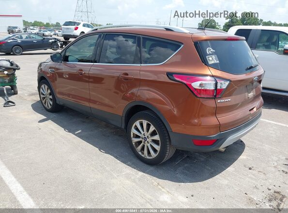 1FMCU0J97HUE42840 2017 FORD ESCAPE Orange Tył lewy