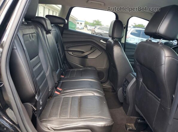 1FMCU0J98HUD37692 2017 FORD ESCAPE Черный Вид задней части салона